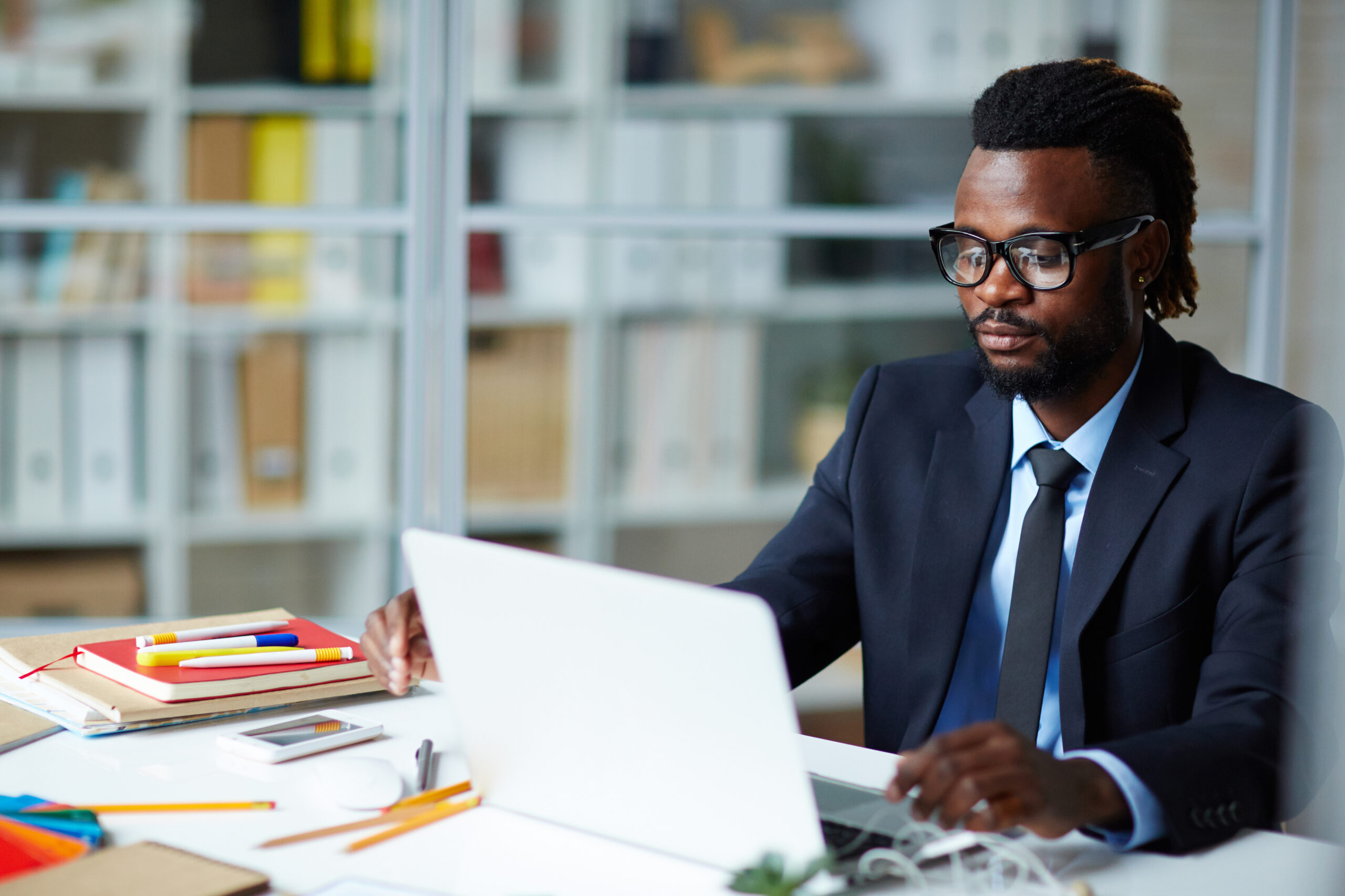 African businessman networking in office